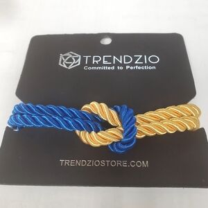 TRENDZIO THE ORIGINAL LOVE KNOT SATIN ROPE BRACELET BLUE/GOLD